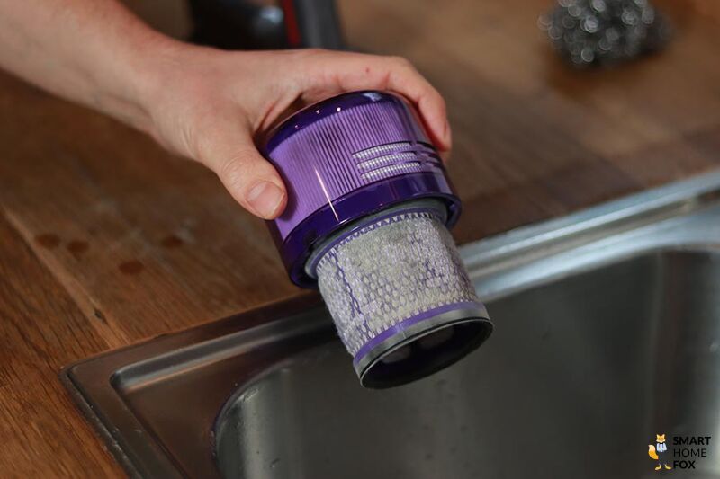Ausklopfen des HEPA-Filters